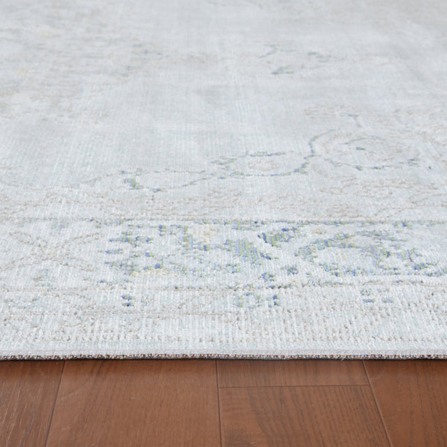 Sea mist medallion area rug flatweave texture with faded blue floral center motif