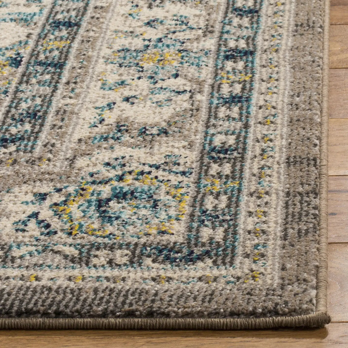 Safavieh Phoenix 100 4'-0" x 6'-0" Rug in Ivory / Grey