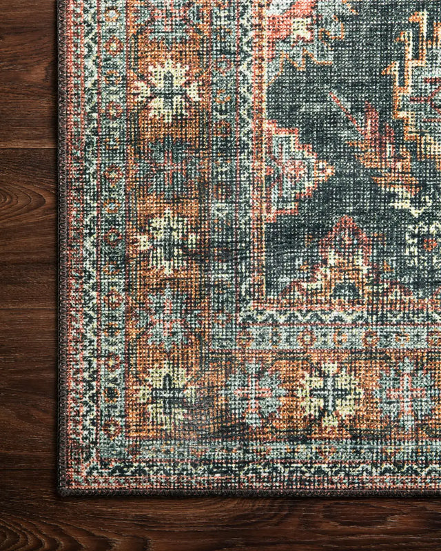 Loloi Skye Sky-10 Sea/Rust Rugs - corner on wood