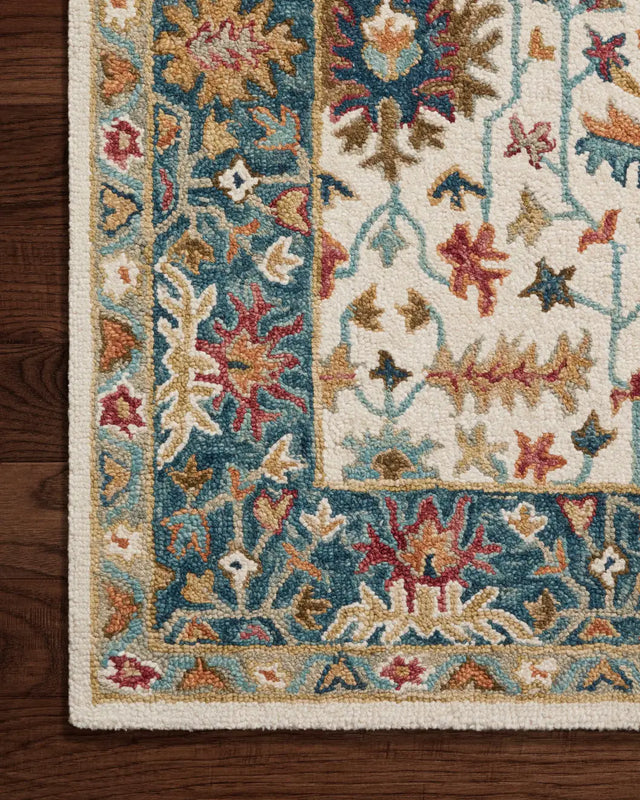 Loloi Victoria Vk-23 Ivory/Sky Rug - corner on wood
