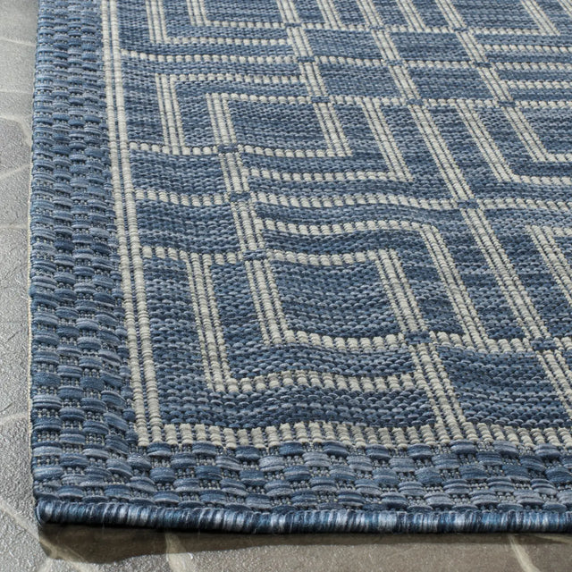 Safavieh Courtyard 5'-3" x 7'-7" Rug in Navy / Grey