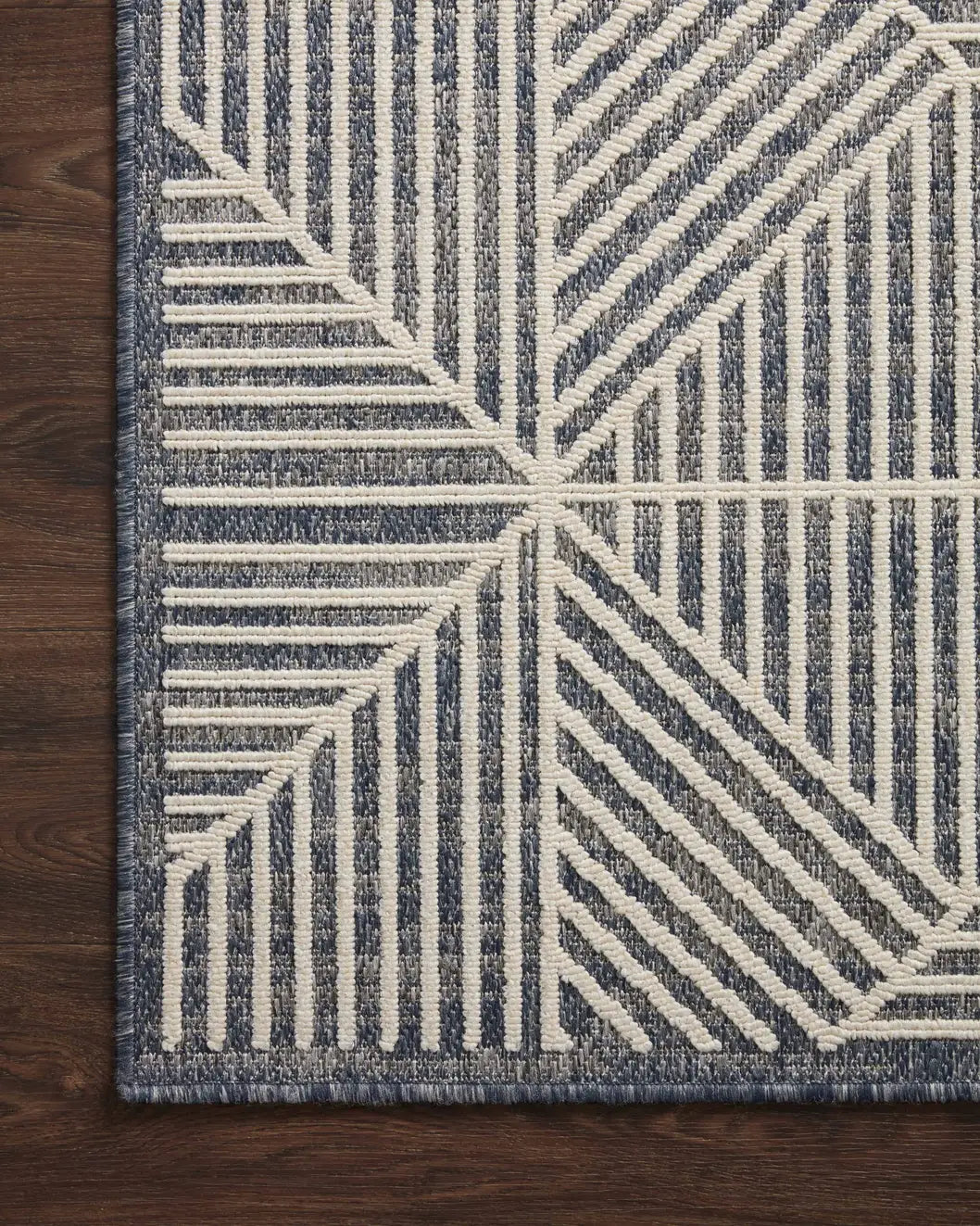 Loloi Rainier Rai-03 Denim/Ivory Rug - corner on wood
