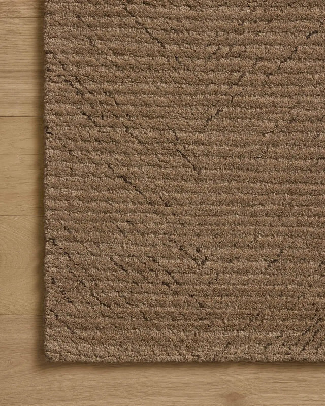 Loloi Kai KAI-01 Pebble Rug - corner on wood