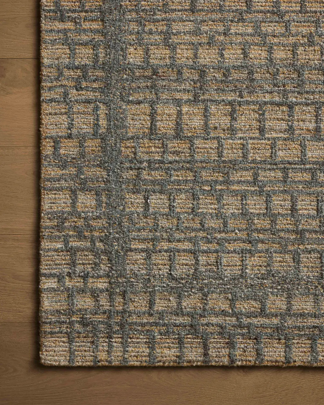Loloi Elias Ela-05 Wheat/Charcoal Rug - corner on wood