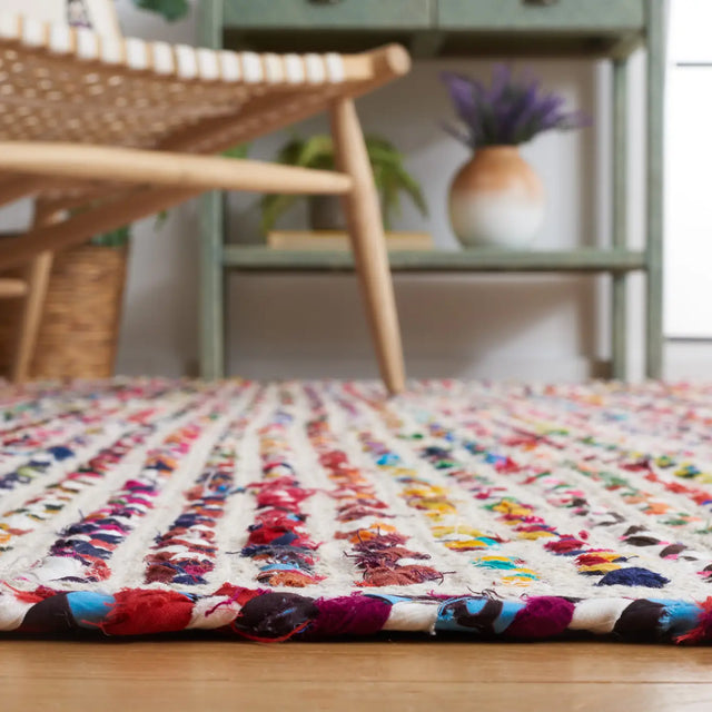 Safavieh Braided 4'-0" x 6'-0" Rug in Ivory / Multi