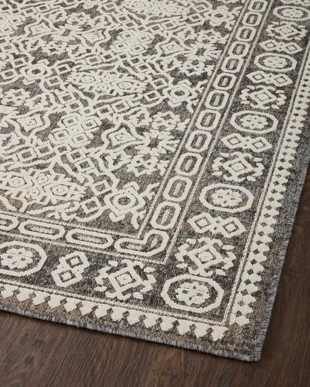 Loloi Rainier Rai-02 Pebble/Ivory Rug - angled corner on wood
