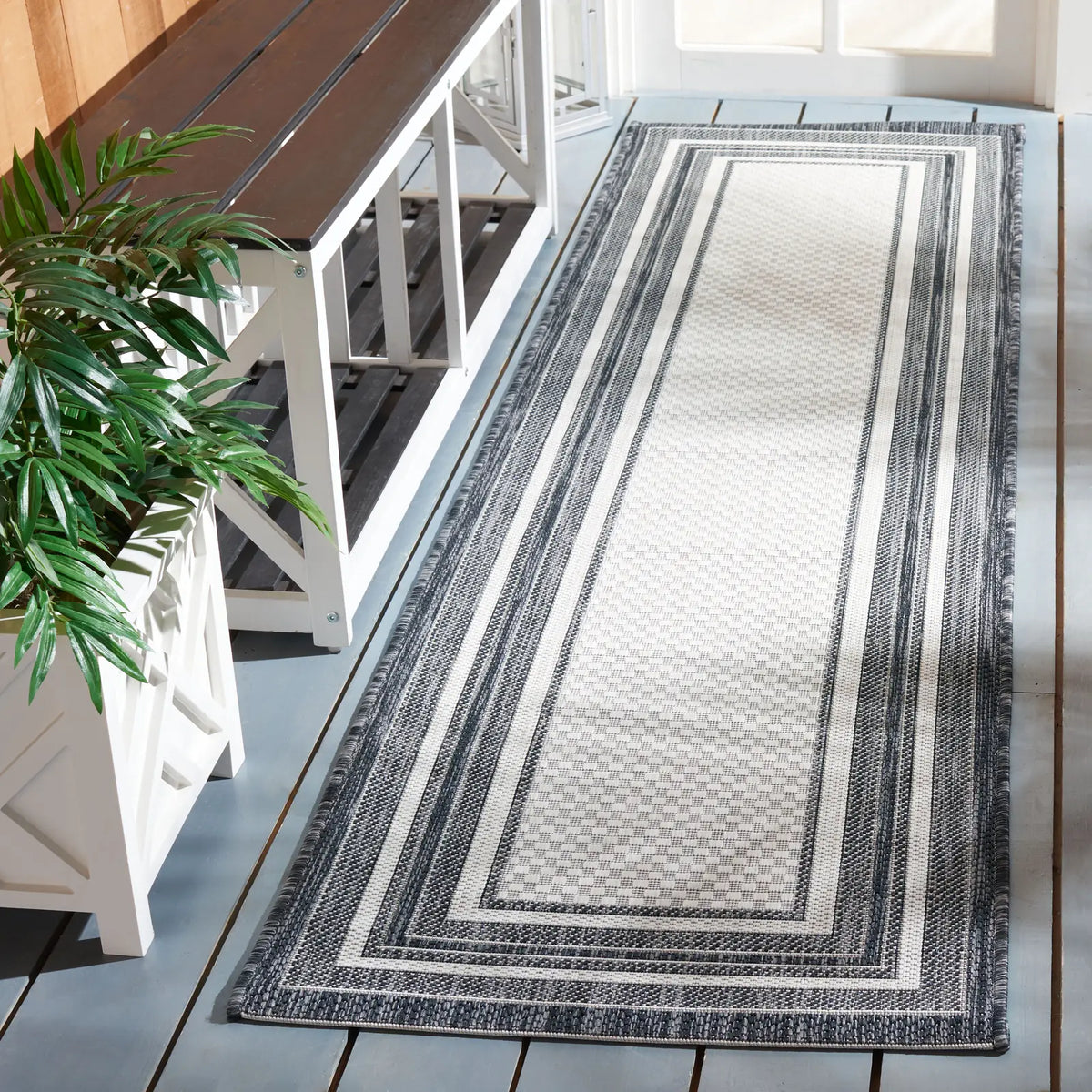 Safavieh Courtyard 2'-3" x 10'-0" Rug in Ivory / Black
