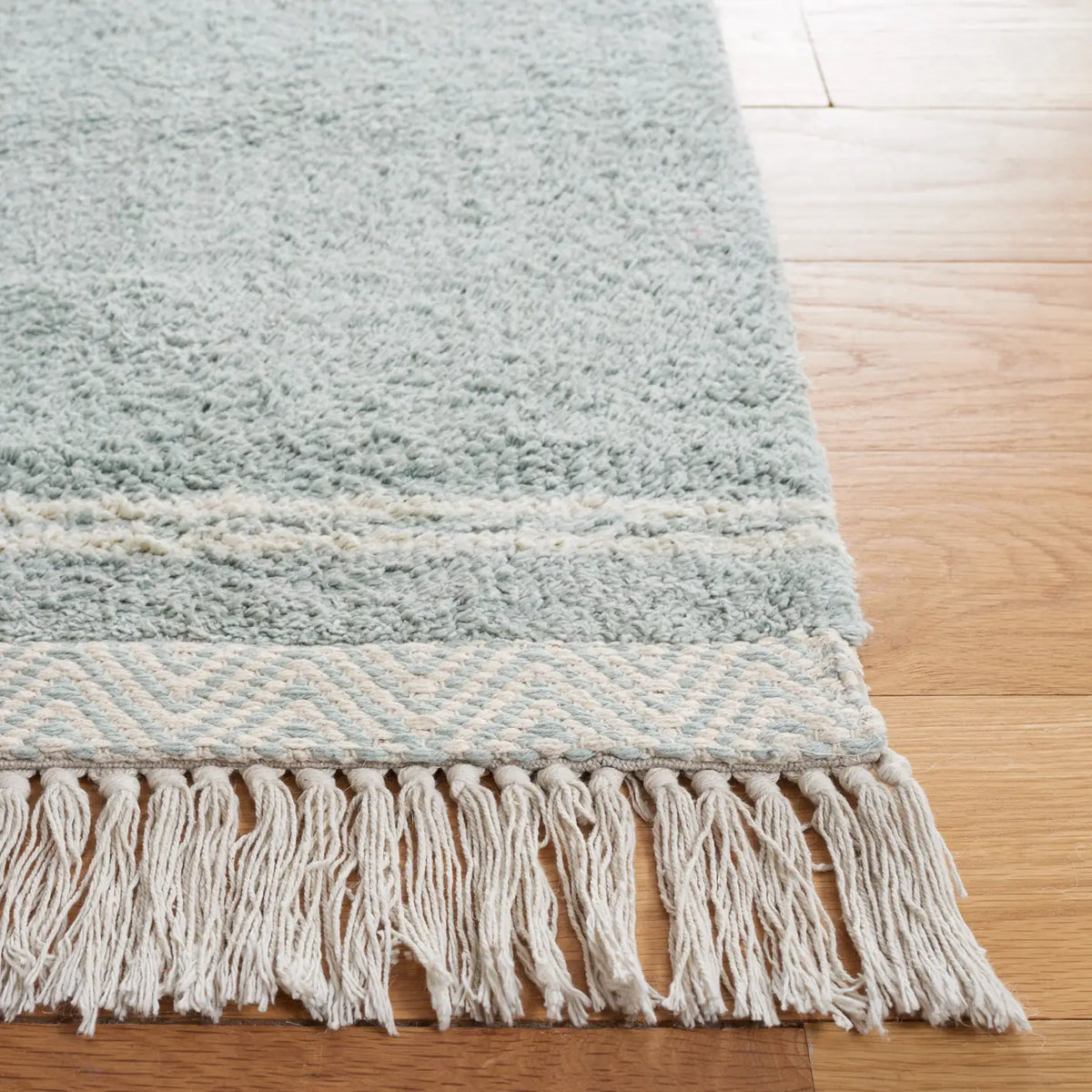 Safavieh Easy Care 5'-0" x 8'-0" Rug in Light Blue / Ivory