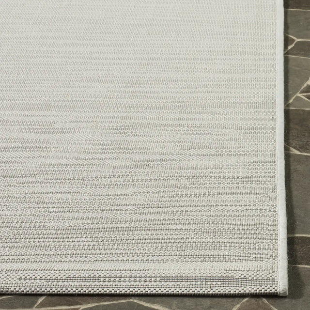 Safavieh Courtyard 5'-3" x 7'-7" Rug in Light Grey