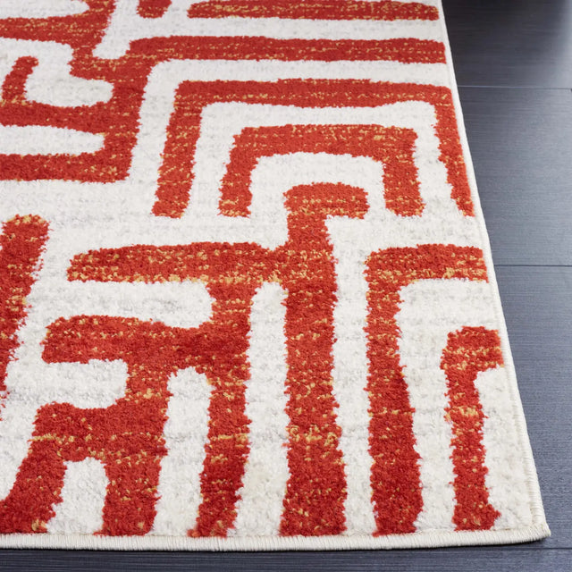 Safavieh Amsterdam 5'-1" x 7'-6" Rug in Ivory / Terracotta