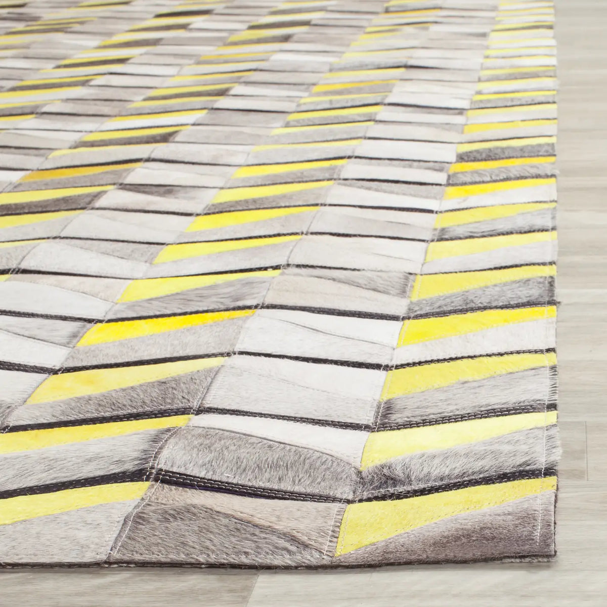 Safavieh Studio Leather 8'-0" x 10'-0" Rug in Ivory / Yellow