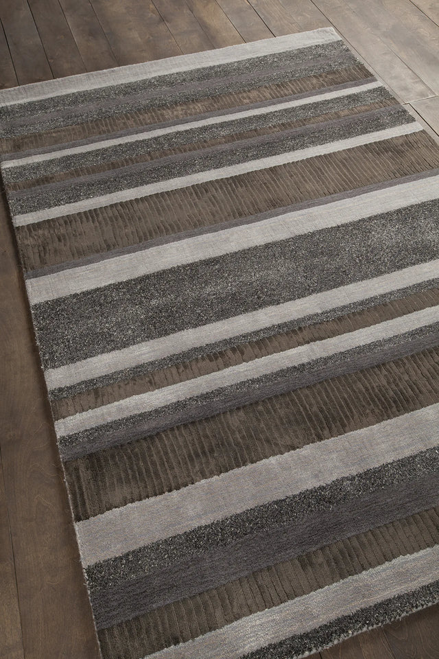 Chandra Amigo AMI-30501 Brown rug, angled side view