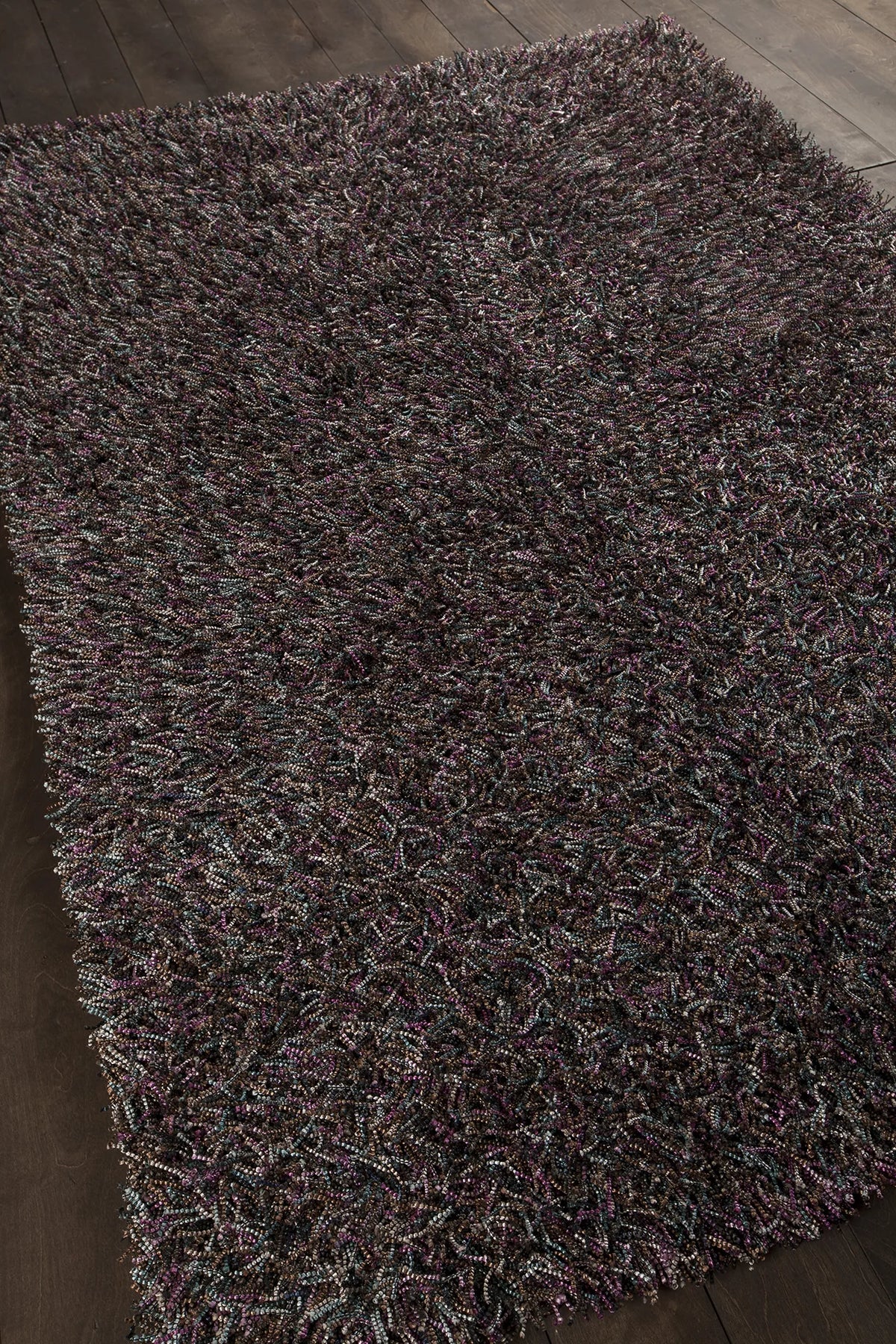 Chandra Astrid AST-14302 Purple and Blue and Brown and Grey and Ivory rug, angled side view