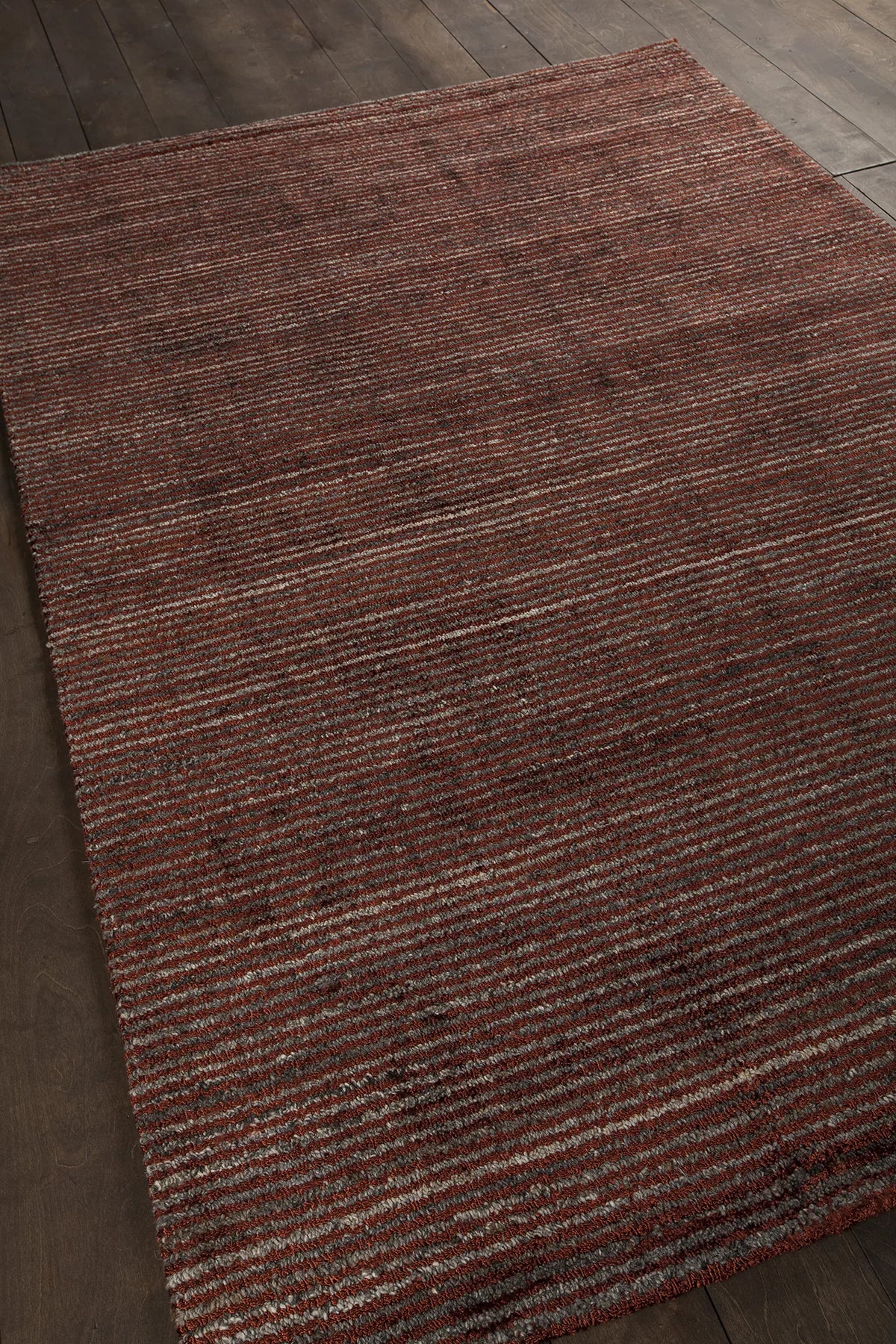 Chandra Citizen CIT-34301 Rust rug, angled side view