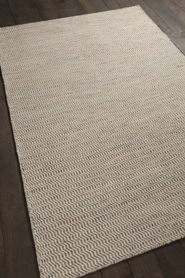Chandra Crest CRE-33500 Beige and Brown rug, angled side view