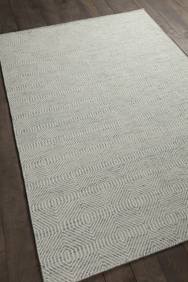 Chandra Crest CRE-33506 Light Blue and Beige rug, angled side view