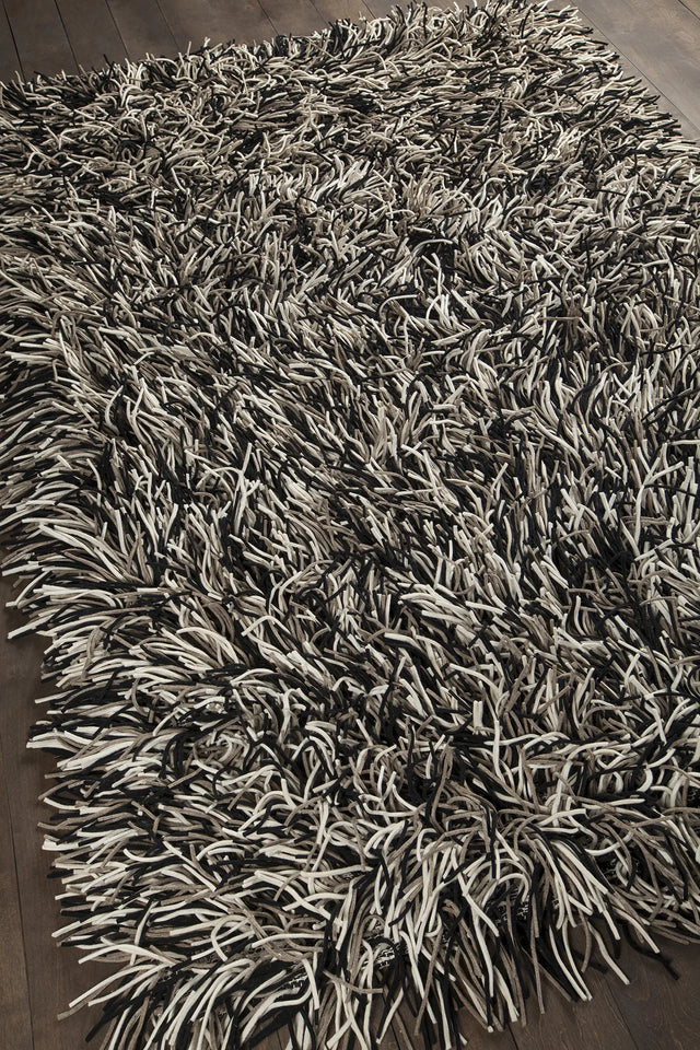Chandra Cyrah CYR-10802 Black and Taupe and Ivory rug, angled side view