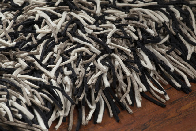 Chandra Cyrah CYR-10802 Black and Taupe and Ivory rug, side detail view