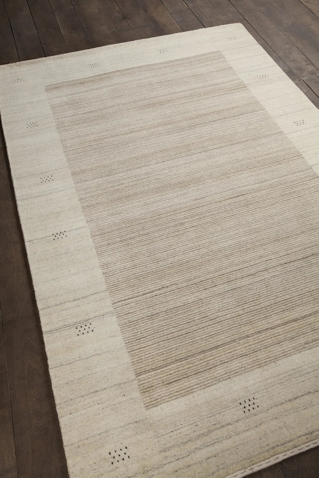 Chandra Elantra ELA-51700 Beige and Brown rug, angled side view
