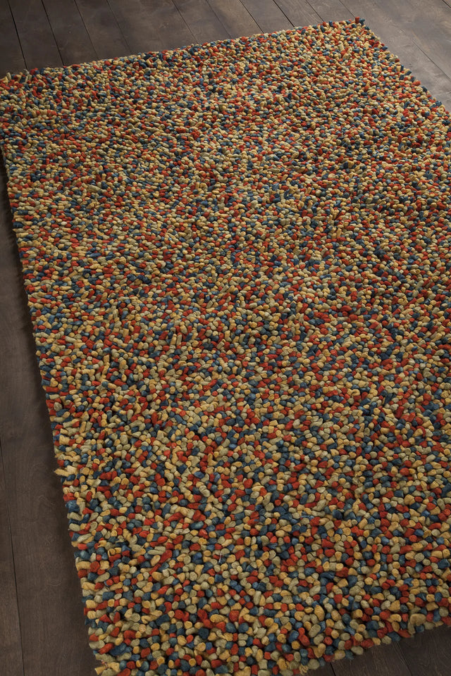 Chandra Gems GEM-9602 Green and Blue and Red rug, angled side view