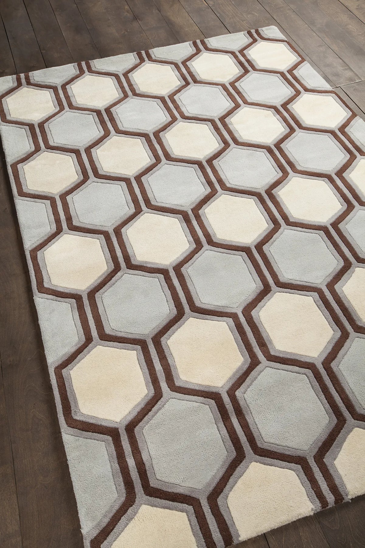 Chandra Inhabit INH-21611 Blue and Brown and White rug, angled side view