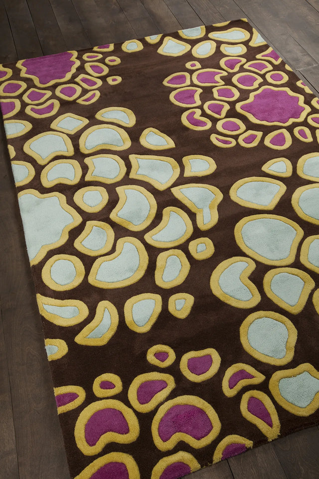 Chandra Inhabit INH-21626 Brown and Pink and Blue and Yellow rug, angled side view