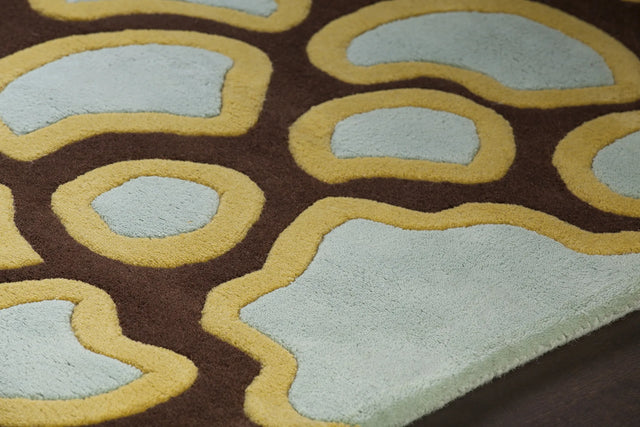 Chandra Inhabit INH-21626 Brown and Pink and Blue and Yellow rug, side detail view
