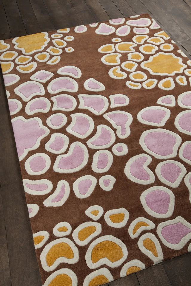 Chandra Inhabit INH-21627 Brown and Orange and Pink and White rug, angled side view