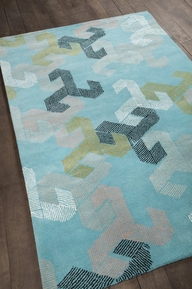 Chandra Jessica Swift JES-28906 Teal and White and Black and Pink and Gold rug, angled side view