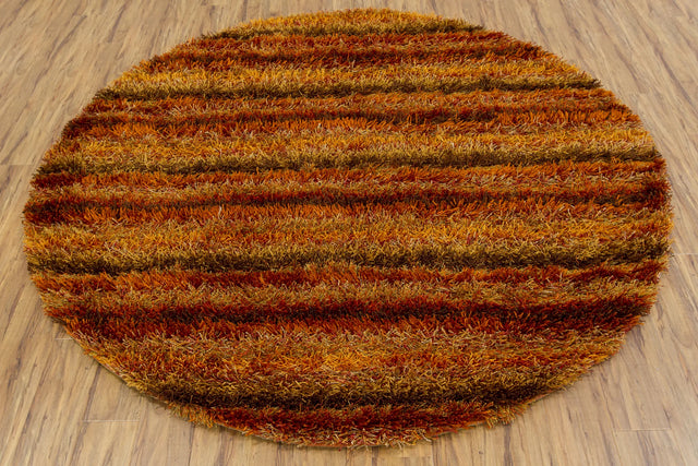 Chandra Kubu KUB-16500 Red and Orange and Brown round rug, flat view