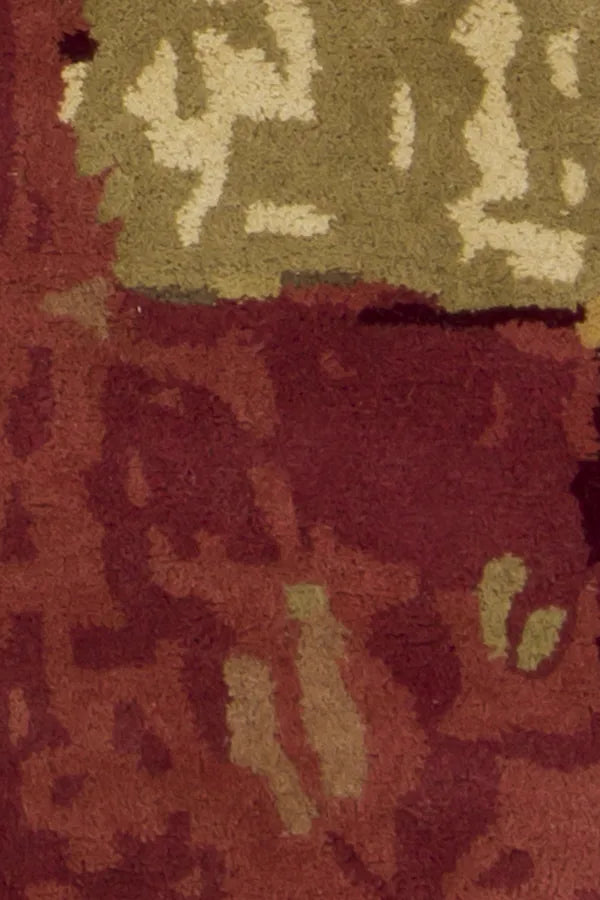 Chandra Nirvana NIR-6602 Burgundy and Green and Tan and Black and Brown rug, texture close-up