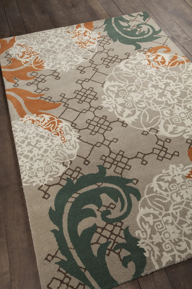 Chandra Stella STE-52207 Tan and Cream and Brown and Orange and Blue rug, angled side view