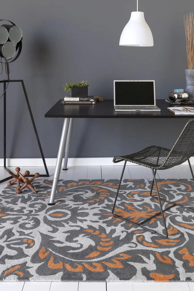 Chandra Stella STE-52253 Grey and White and Orange rug, shown in a room setting