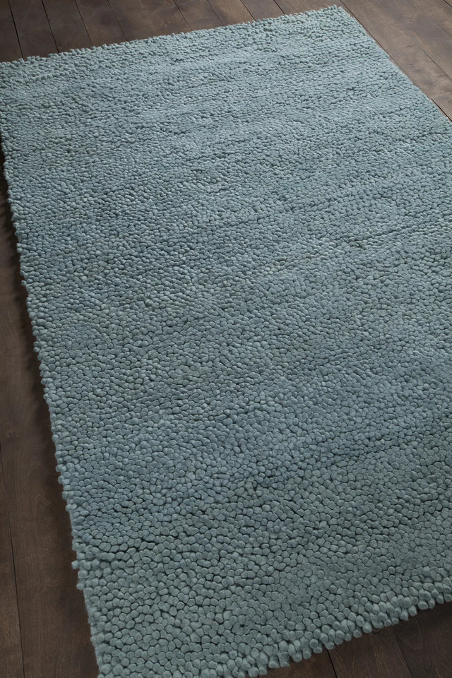 Chandra Strata STR-1124 Blue rug, angled side view
