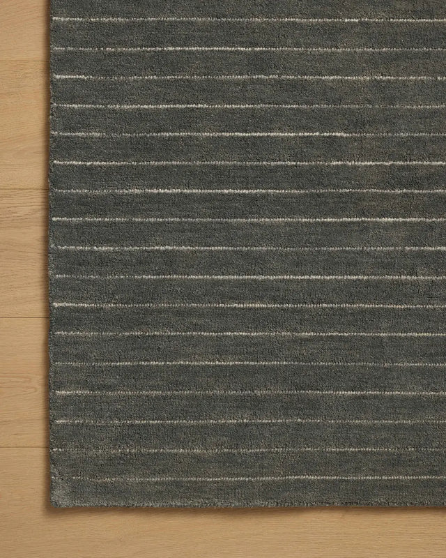 Chris Loves Julia x Loloi Henry HEY-01 Charcoal / Ivory Rug - corner on wood
