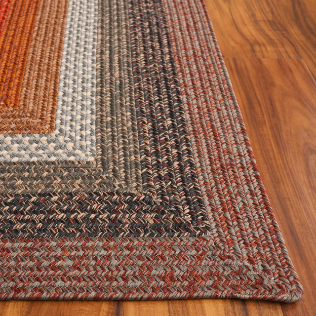 Safavieh Braided 5'-0" x 8'-0" Rug in Brown / Rust