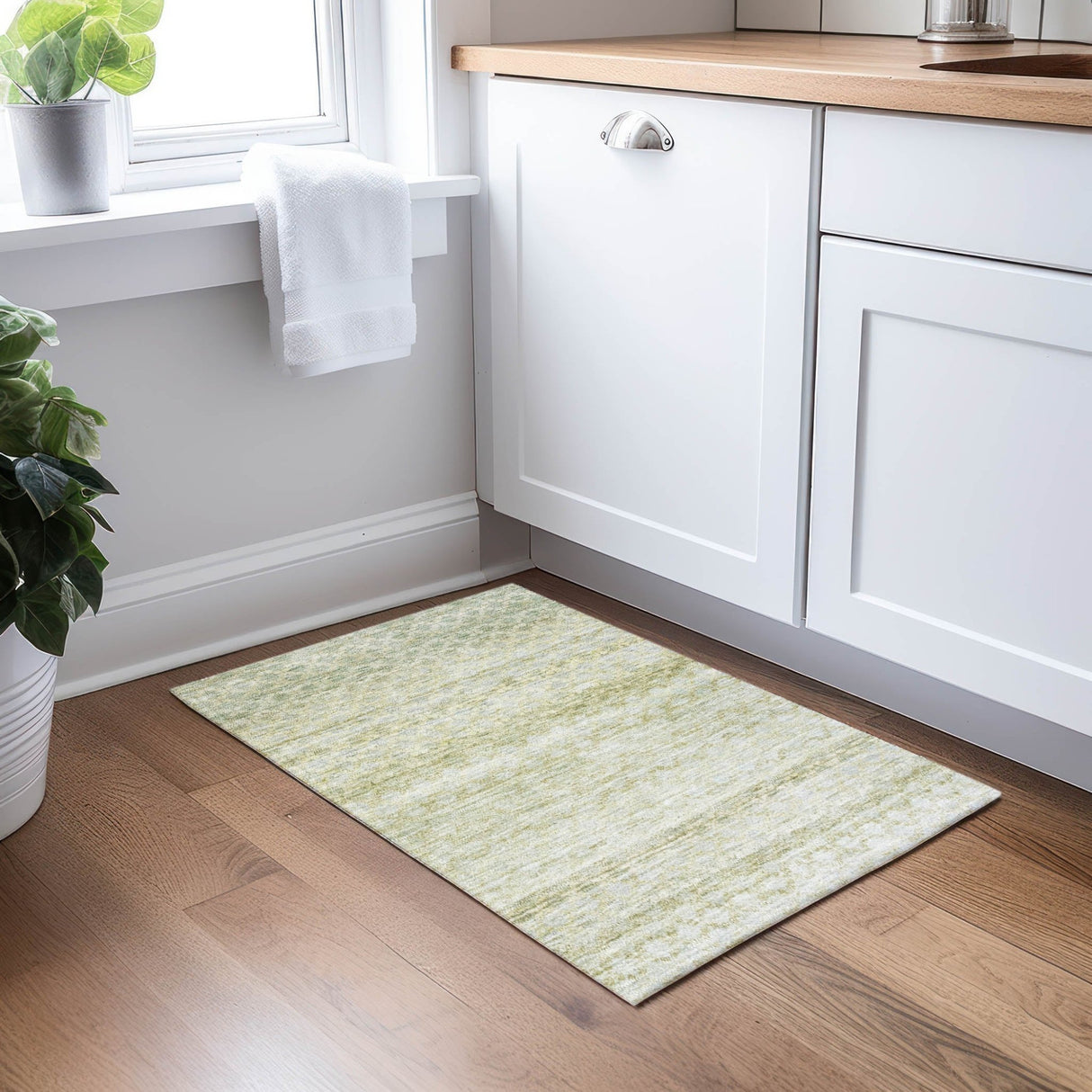 Dalyn Burano BU6 Aloe Rug shown in a room