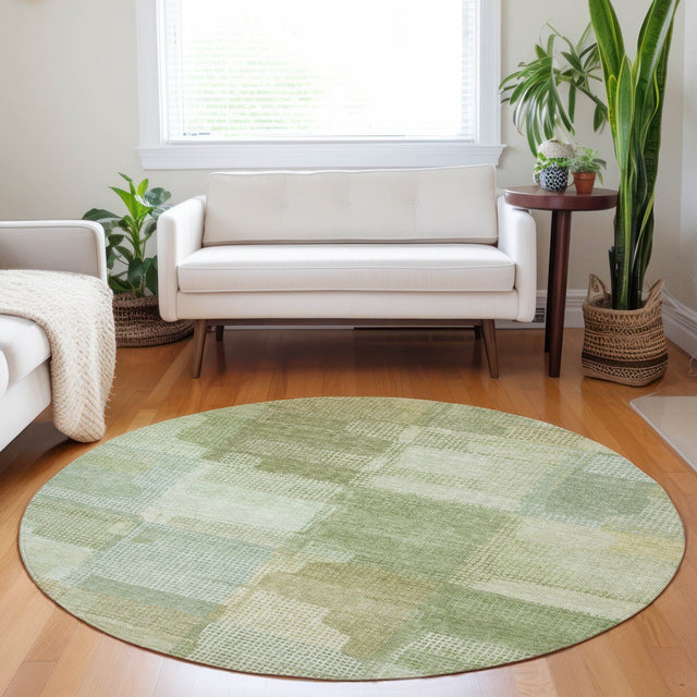 Dalyn Ravenna RN10 Green Rug shown in a room