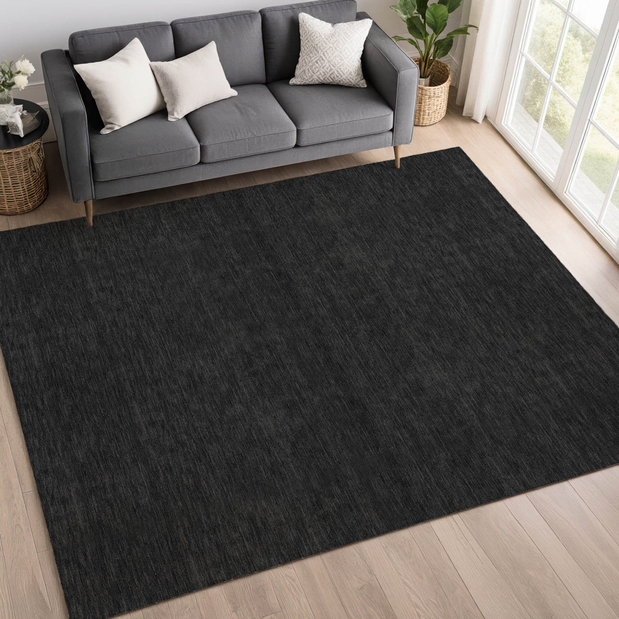 Dalyn Soft Essentials SE6 Black Rug shown in a room