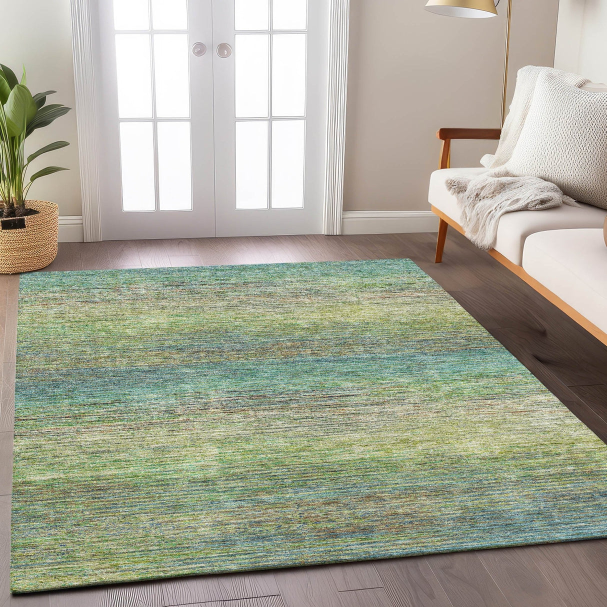 Dalyn Trevi TV1 Aloe Rug shown in a room