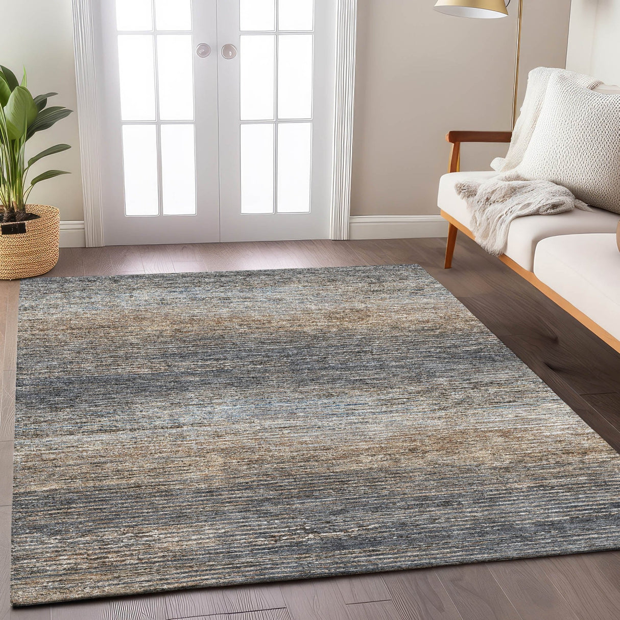 Dalyn Trevi TV1 Pewter Rug shown in a room