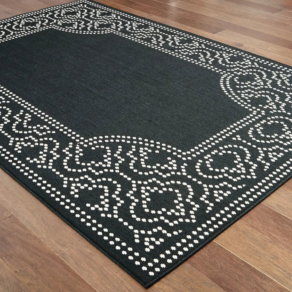 Oriental Weavers Sphinx Marina 1247K Black / Ivory Rugs - angle detail