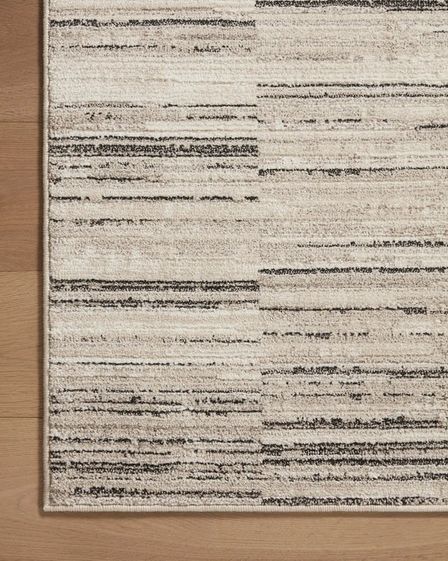 Loloi Darby Dar-01 Charcoal/Sand Rug - corner on wood
