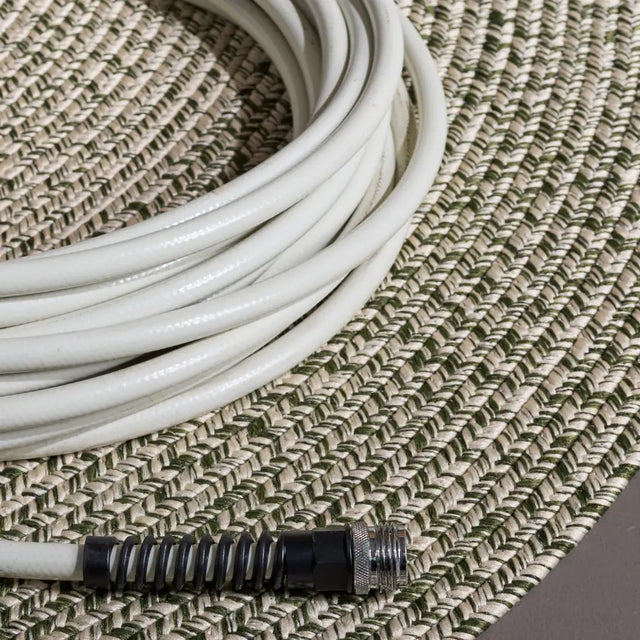 Safavieh Braided 5'-0" x 8'-0" Rug in Beige / Green