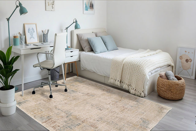 Rectangular modern grey-and-beige area rug with distressed abstract pattern