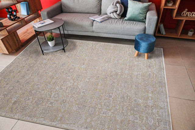 Beige and grey traditional patterned rectangular power-loomed rug