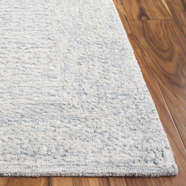 Safavieh Pine 4'-0" x 6'-0" Rug in Light Blue / Ivory