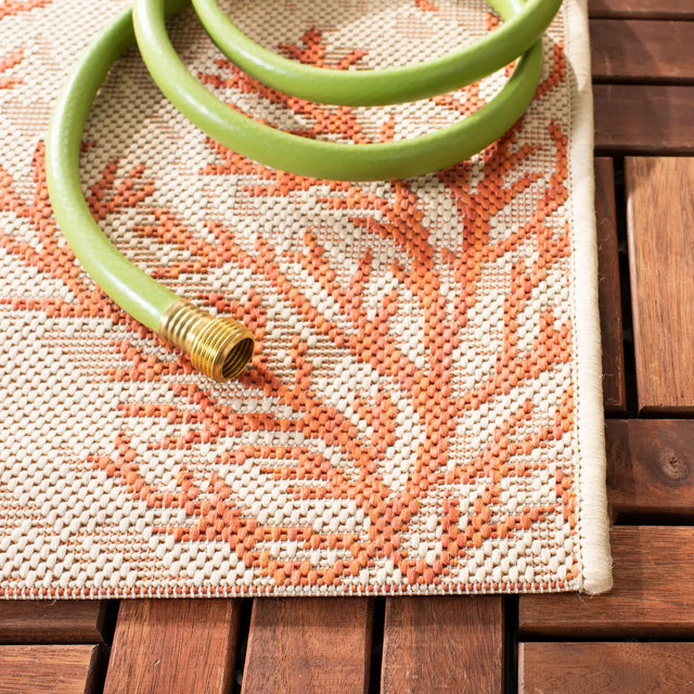 Safavieh Courtyard 5'-3" x 7'-7" Rug in Beige / Terracotta