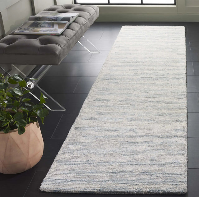 Safavieh Ebony 2'-3" x 9'-0" Rug in Ivory / Light Blue