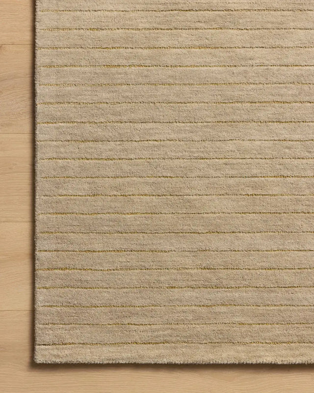 Chris Loves Julia x Loloi Henry HEY-01 Beige / Wheat Rug - corner on wood
